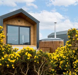 A building with a window and a hot tub at The Grays in North Berwick