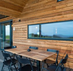 A terrace with a table and chairs at The Irvine in North Berwick