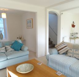 A living room with sofas and a coffee table at Mount Pleasant in Padstow