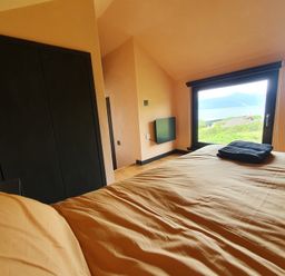 A bedroom with a view at Cullinview Isle of Skye