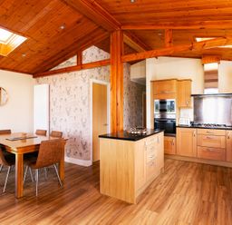 A kitchen with dining area at Hedgehog Lodge York