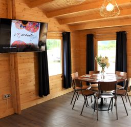 A dining room with a table and chairs at Cotswold Nights Away Evesham