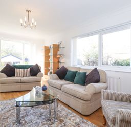 A living room with sofas and a coffee table at Wansfell View in Ambleside