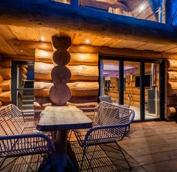 An outdoor seating area with a table and chairs at The Lookout in Addingham