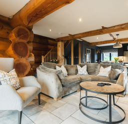 A living room with a sofa and coffee table at Apres Ski in Addingham