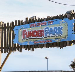 A welcome sign for Funder Park open daily at 10am at Upper Longlands, Dawlish