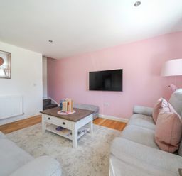 A living room with a sofa and coffee table at James Ville Marina Lodge 23, Brigg