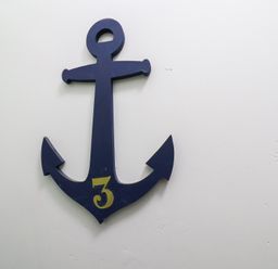 A blue anchor with the number 3 at Apartment 3 in Scarborough