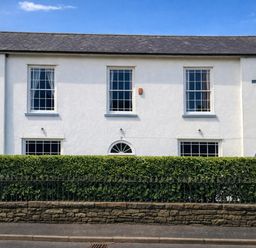 A building with windows and a door at Picton House near St Clears
