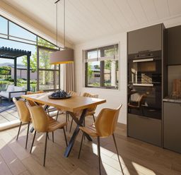 A dining room with a table and chairs at Lonscale (Pet) Penrith