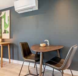 A dining room with a table and chairs at Arvor Studio 1.0 Bude