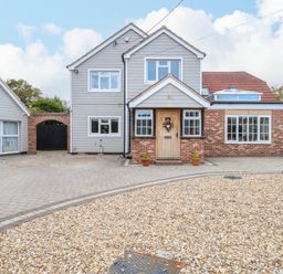 A house with a driveway and gravel at Oldfields in Bury St Edmunds
