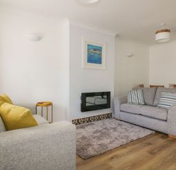 A living room with sofas and a coffee table at Seahorses in Padstow