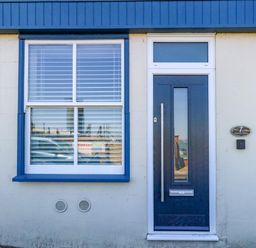 A door and window on a house at Chandlers Nook in Portland