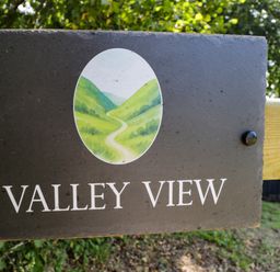 A sign displaying the name Valley View at Valley View Shepherd's Hut in South Molton