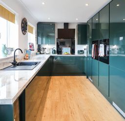 A kitchen with appliances and countertop at Seaview in Pakefield