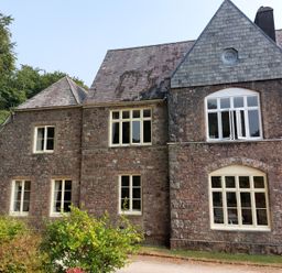 A house with stone walls and windows at Lukesland Wing near Ivybridge
