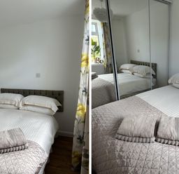 A bedroom with a bed and pillows at Dog-friendly lodge, steps to St Ives train Hayle