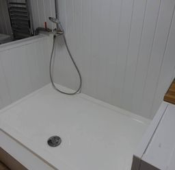 A shower with a showerhead and drain at Cottage - Sleeps 2 - Garden in Coleford