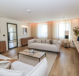 A living room with a coffee table and sofa at Brynseion Uchaf near Aberystwyth