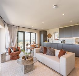 A living room with a sofa and coffee table at tbc in St. Ives