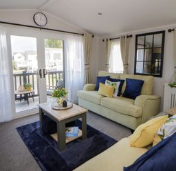 A living room with furniture and a view at Santa Maria in Llandysul