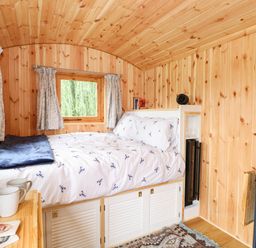 A bedroom with bed and window at Laurel in Welney near Littleport