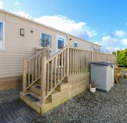 An outdoor area with steps and a shed at Plot 41 High Hesket near Armathwaite
