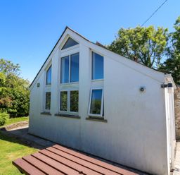 A house with windows and garden at Tegfan in Newport