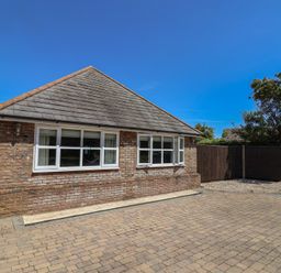 A house with windows and a driveway at Frome View Wool