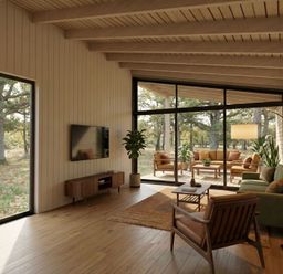 A living room with a coffee table and television at Arbora 1.0 Spa (Pet) in Malvern