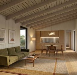 A living room with a sofa and dining area at Arbora 1.0 (Pet) Malvern