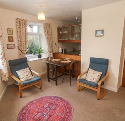 A dining room with table and chairs at Chyancrowse in Gulval