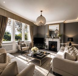 A living room with a sofa and coffee table at Chowdene Lodge Estate