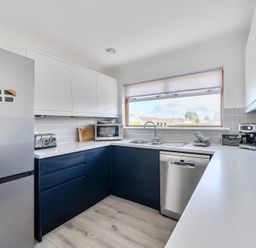 A kitchen with appliances and sink at Sleeps 9 KingBeds Family Friendly, Pityme near Penmayne
