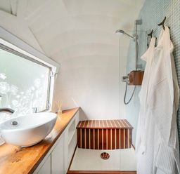 A bathroom with a sink and shower at Sleeps 2 - Private Hot Tub - Fire Pit, St. Dogmaels near Cardigan