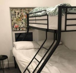 A bedroom with a bunk bed and a double bed at 3Bed Cottage Plymouth Dog friendly Sleeps7 in Plymouth