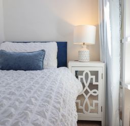 A bedroom with a bed and nightstand at Cnicht View in Porthmadog