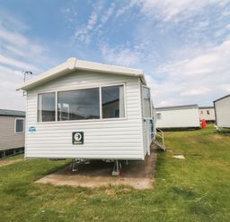 A caravan in an outdoor area at 42 Oak Green