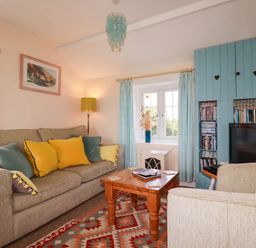 A living room with a sofa and coffee table at The Granary in 