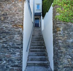 A staircase leading to an entrance at 2 Inglewood Apartments in Dartmouth