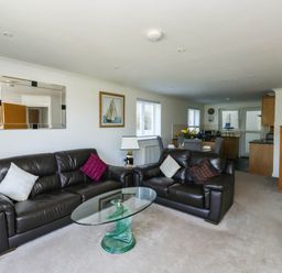 A living room with a sofa and coffee table at 2 Inglewood Apartments in Dartmouth
