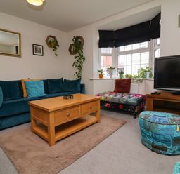 A living room with a sofa and coffee table at Manning's View in Barnstaple
