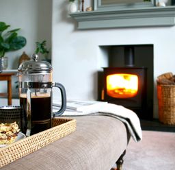 A living room with a coffee maker and food on a tray at Beautiful 6Bed Sleeps 12 Stunning Views Lynton