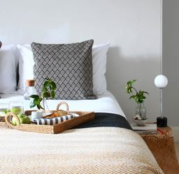 A bedroom with a bed and decorative pillows at Beautiful 6Bed Sleeps 12 Stunning Views in Lynton