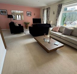 A living room with sofas and a coffee table at River Tamar Couples Retreat Dog Friendly Newbridge