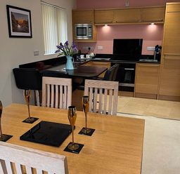 A kitchen with dining area at River Tamar Couples Retreat Dog Friendly Newbridge
