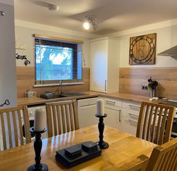 A kitchen with dining area and appliances at Blairgowrie Luxury 3 Bed Lodge with Hot Tub in Blairgowrie
