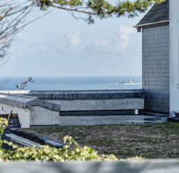 A view of the sea from a building overlooking the coast at 1 Bedroom Apartment Sleeps 2 Pets Welcome in Carbis Bay