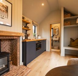 A kitchen with a stove and sink at 2 West Dunkirk Neuk in Humshaugh
